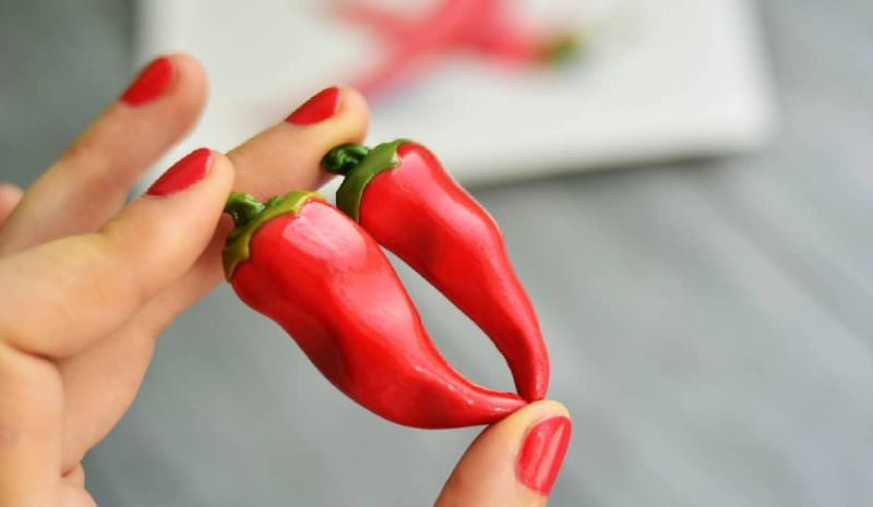 Chili peppers in the hand