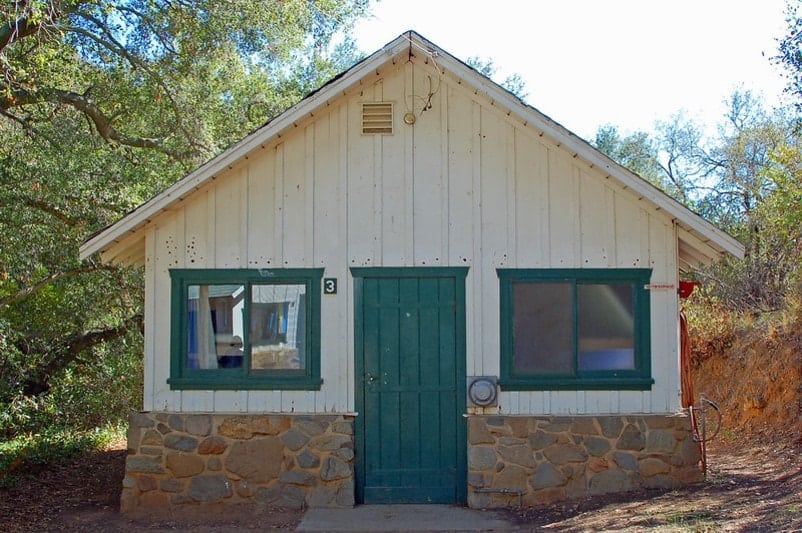 house with woodpecker holes