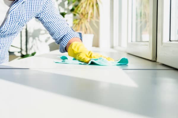 man cleaning his house