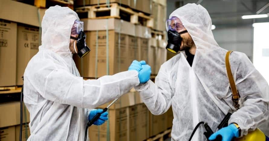 two employees of pest control at the factory